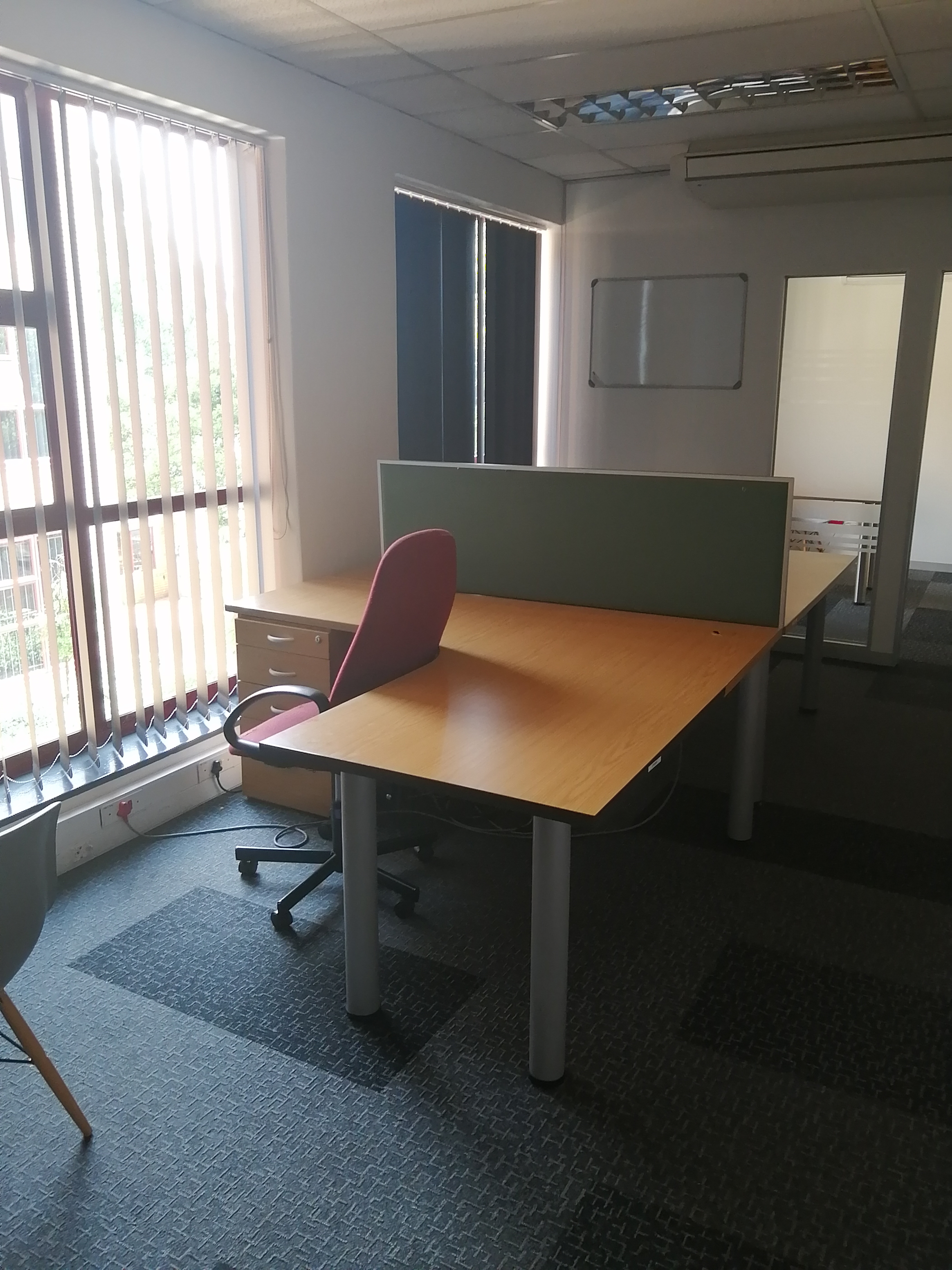 Open plan (4 seater desk) in 32sqm office .jpg
